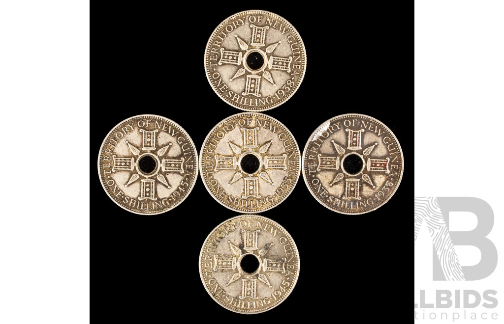 Five Territory of New Guinea Silver Shillings 1935(2), 1938, 1945(2)  .925