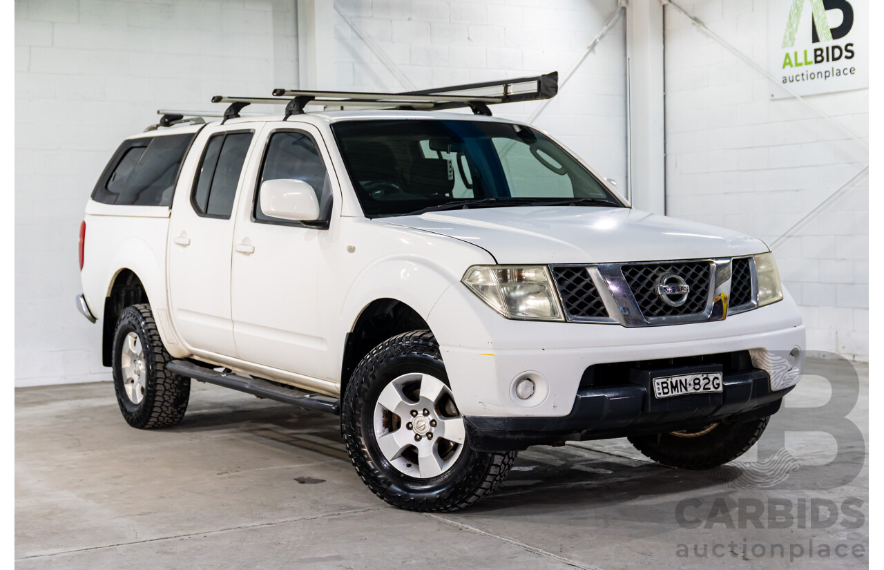 1/2010 Nissan Navara ST (4x4) D40 Dual Cab P/Up Polar White Turbo Diesel 2.5L