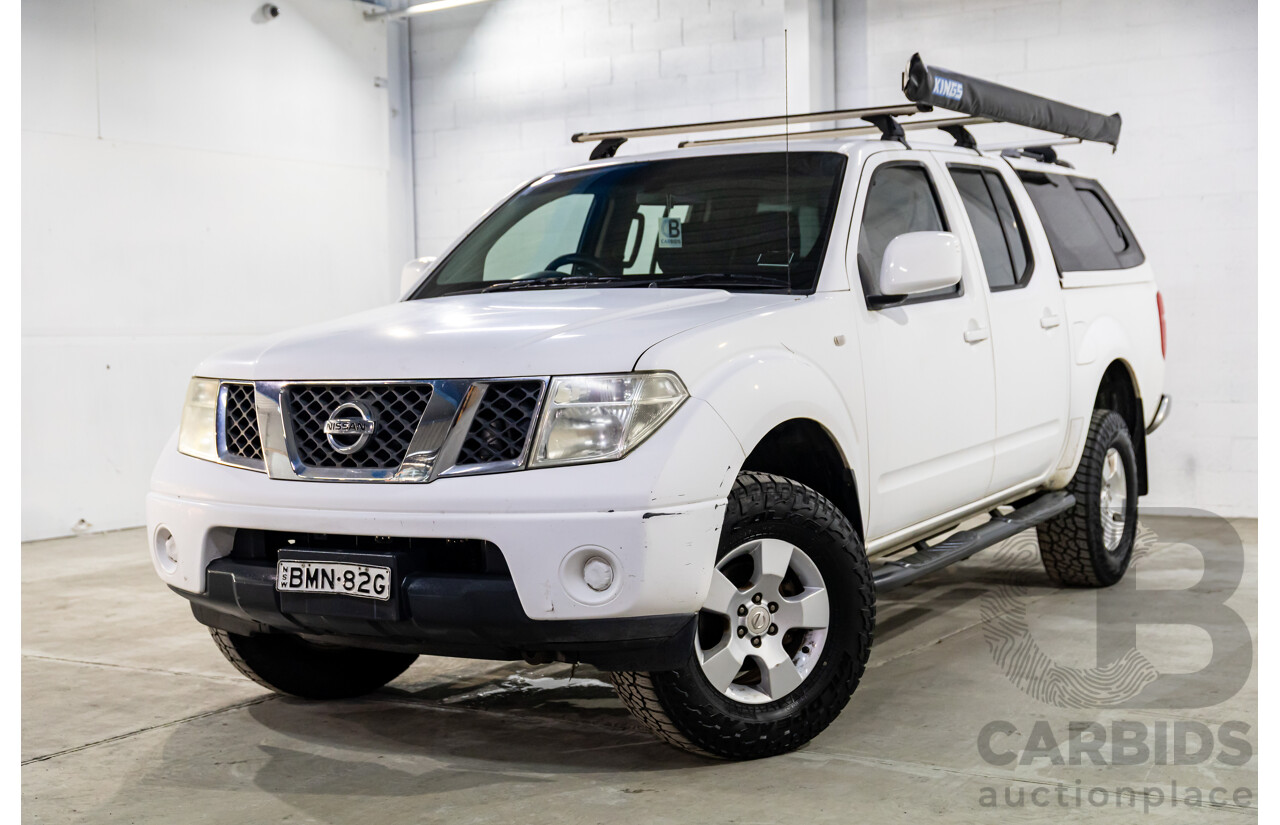 1/2010 Nissan Navara ST (4x4) D40 Dual Cab P/Up Polar White Turbo Diesel 2.5L