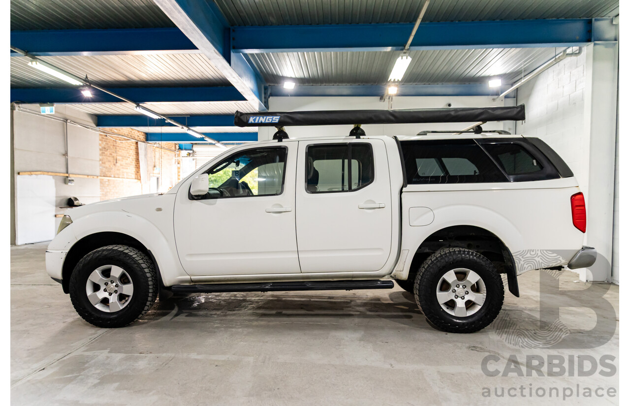1/2010 Nissan Navara ST (4x4) D40 Dual Cab P/Up Polar White Turbo Diesel 2.5L