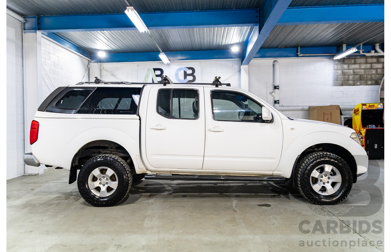 1/2010 Nissan Navara ST (4x4) D40 Dual Cab P/Up Polar White Turbo Diesel 2.5L
