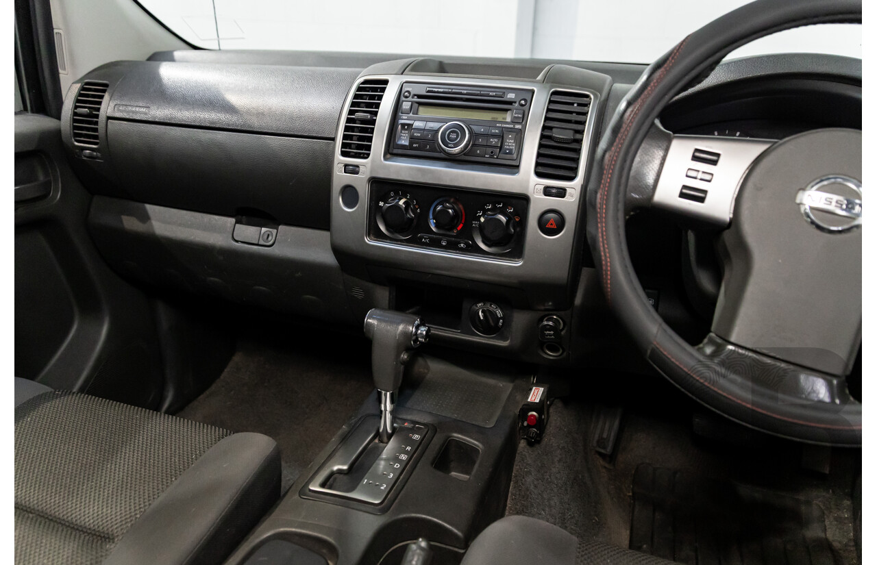 1/2010 Nissan Navara ST (4x4) D40 Dual Cab P/Up Polar White Turbo Diesel 2.5L