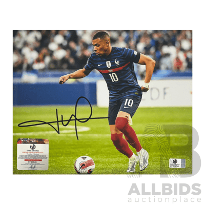 Kylian Mbappé Action Photo Boldly Signed with Premium Authentication.