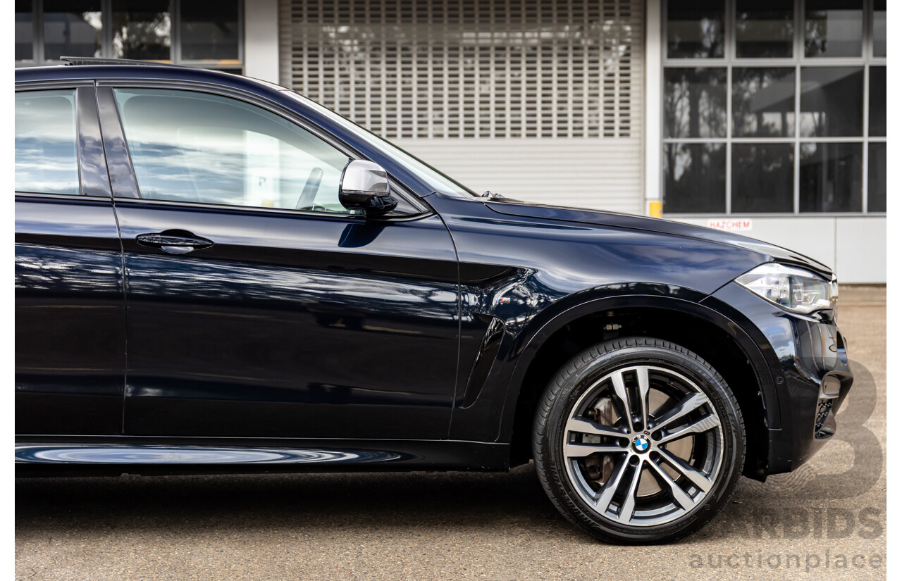 11/2014 BMW X6 M50d E71 MY14 4d Coupe Carbon Black Metallic Triple Turbo Diesel 3.0L