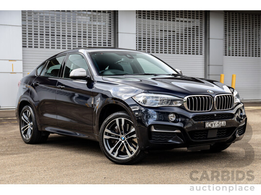 11/2014 BMW X6 M50d E71 MY14 4d Coupe Carbon Black Metallic Triple Turbo Diesel 3.0L