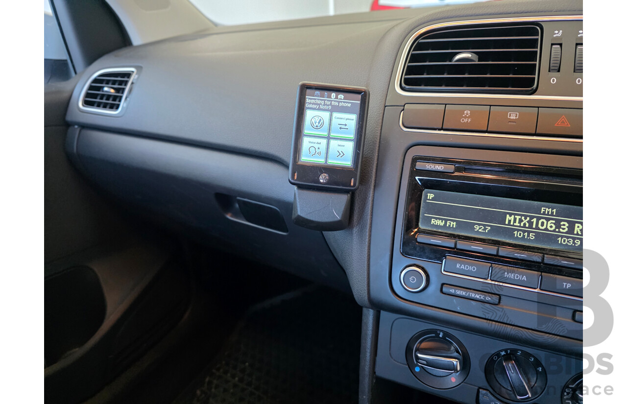 4/2013 Volkswagen Polo 66 TDI Comfortline 6R MY13 5d Hatchback White 1.6L
