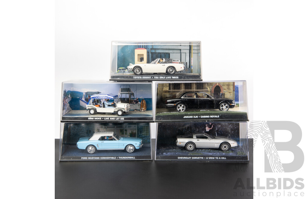 Five Boxed Diecast James Bond Vehicles Including Jaguar, Mini Moke, Corvette, Mustang, Toyota