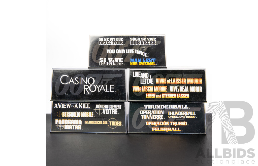 Five Boxed Diecast James Bond Vehicles Including Jaguar, Mini Moke, Corvette, Mustang, Toyota