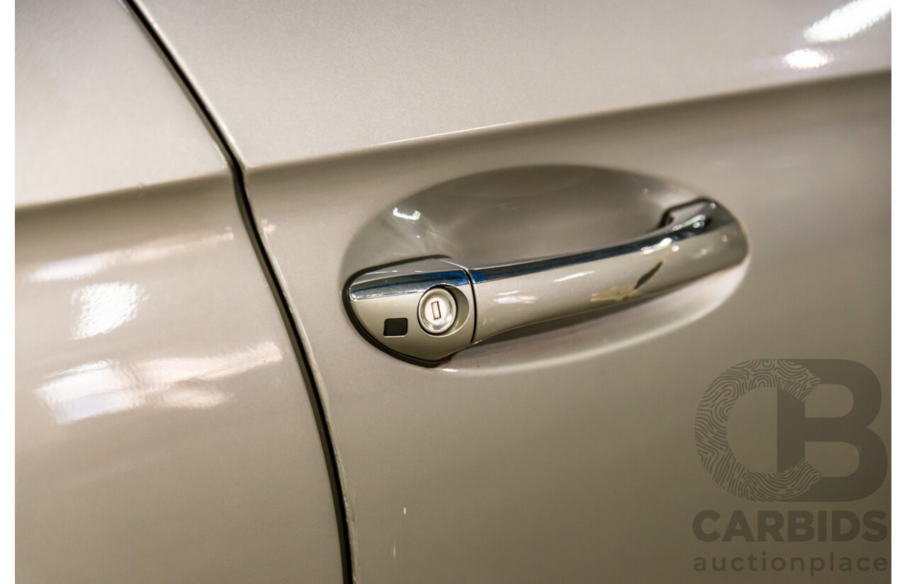 8/2005 Mercedes-Benz CLS 350 219 4d Coupe Cubanite Silver Metallic V6 3.5L