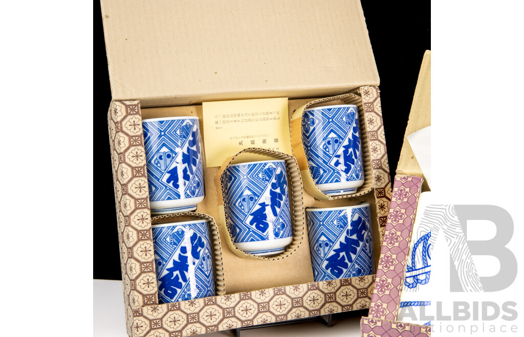 Complete Set Five Piece Japanese Porcelain Cups with Fan and Drum Motif, Along with Set Five Hand Painted Plates with Fan Motif, Both Sets in Original Box