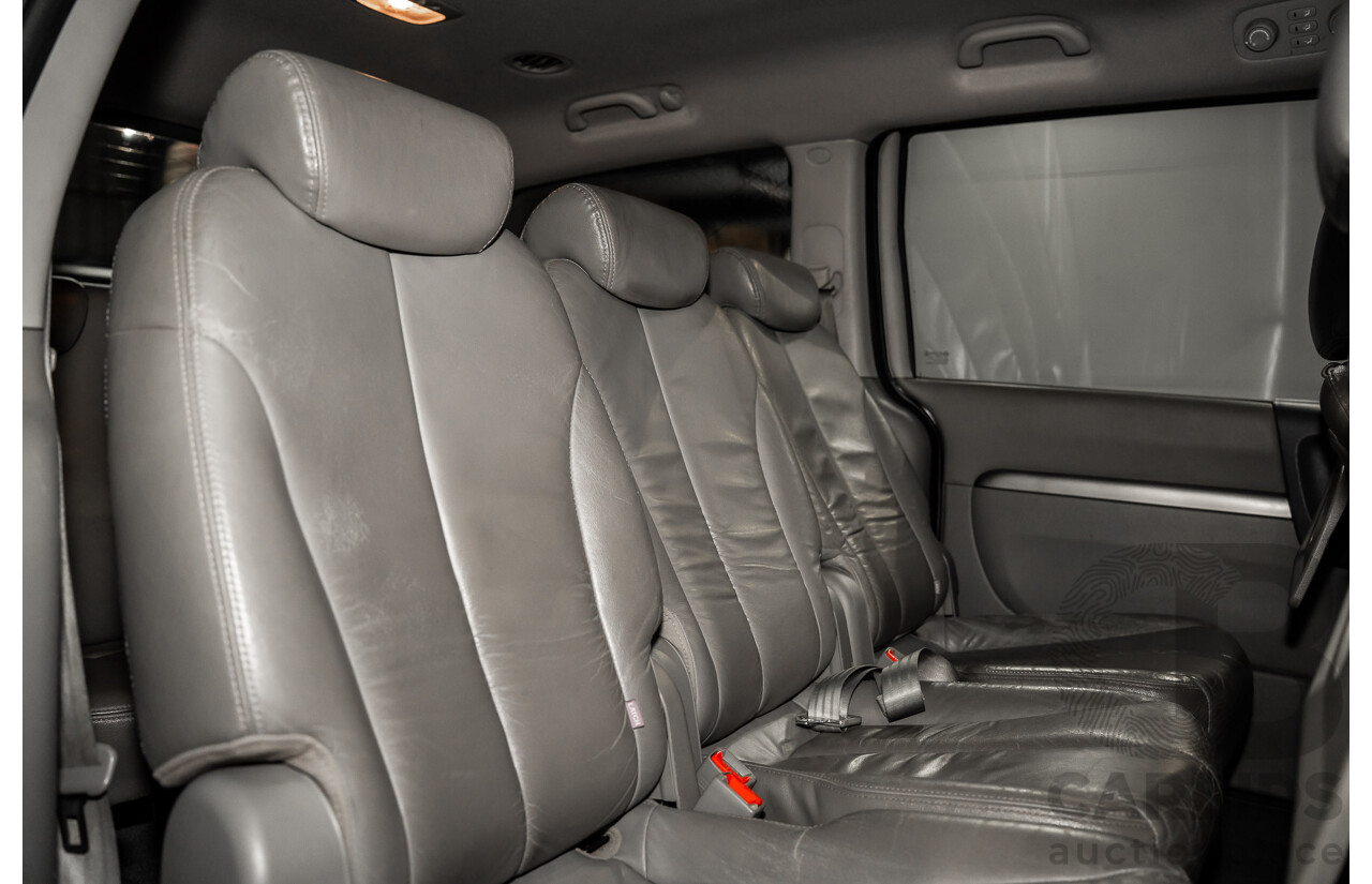 11/2007 Kia Grand Carnival Premium VQ 4d Wagon Midnight Black Metallic V6 3.8L - 7 Seater