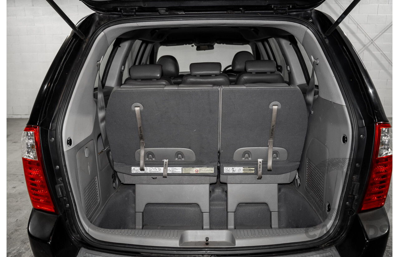 11/2007 Kia Grand Carnival Premium VQ 4d Wagon Midnight Black Metallic V6 3.8L - 7 Seater