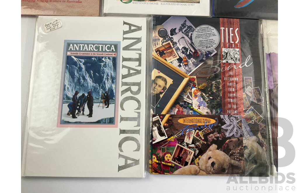 Seven Australian Postal Stamp Books Including Antarctica, International Year of the Family, Christmas Magic, the Women of Oz, Bush Nativity, the World Down Under, Australians Under Fire
