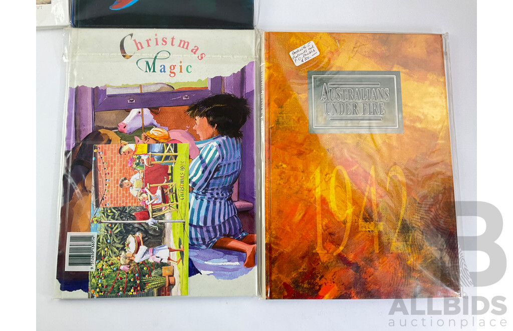 Seven Australian Postal Stamp Books Including Antarctica, International Year of the Family, Christmas Magic, the Women of Oz, Bush Nativity, the World Down Under, Australians Under Fire