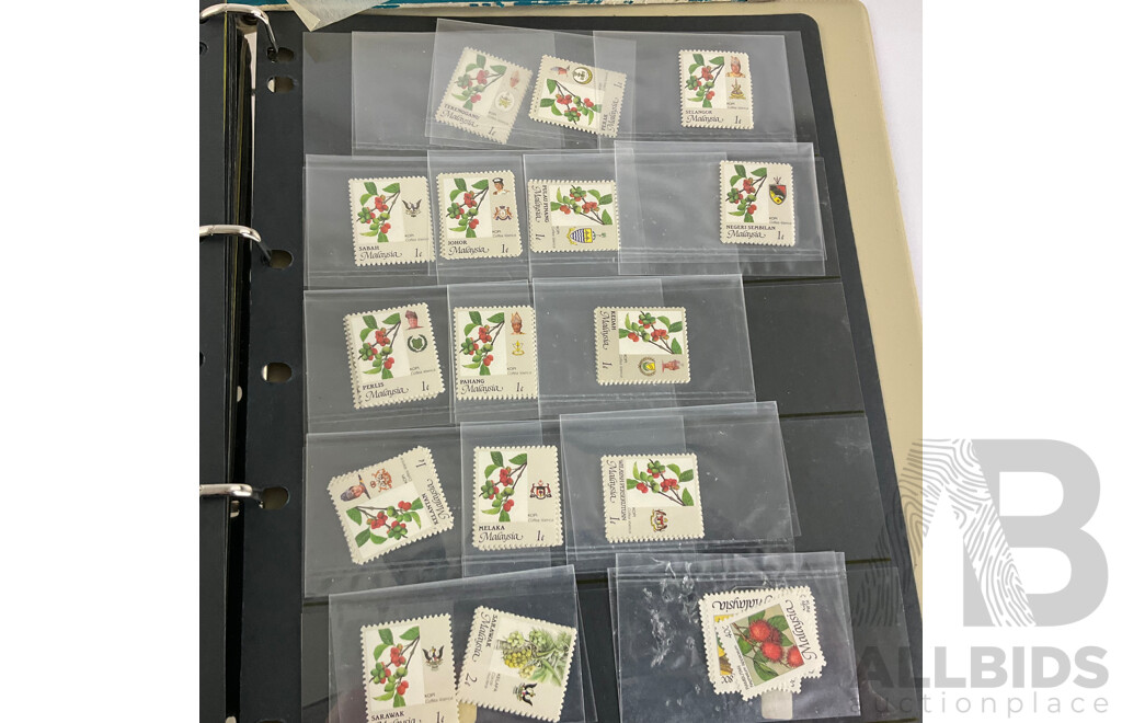 Two Albums of Vintage Chinese and Malaysian Stamps, Mints, Over Prints