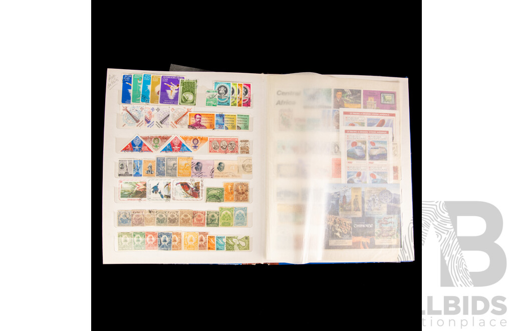 Two Albums of International Antique/Vintage Stamps Including Monaco, Tuvalu, French Colonies, Tunisie, Herm Island, Gabon, Republic of Guinea, Polynesia, Brunei, Chad, Maldives, Portugal 1892 to 1992