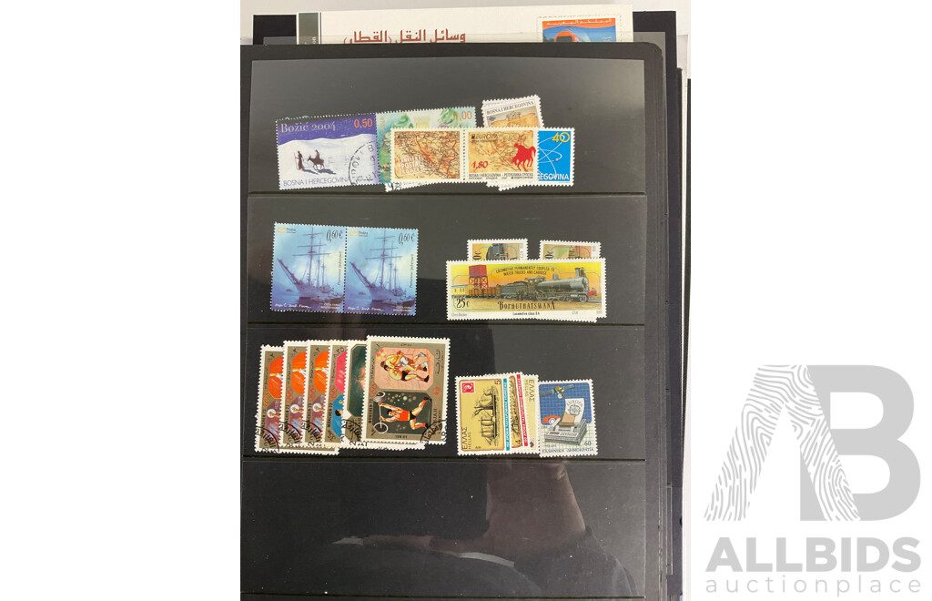 Album of International Stamps Including Australia, USA, UK, Maldives, Pakistan, Malta, Mints