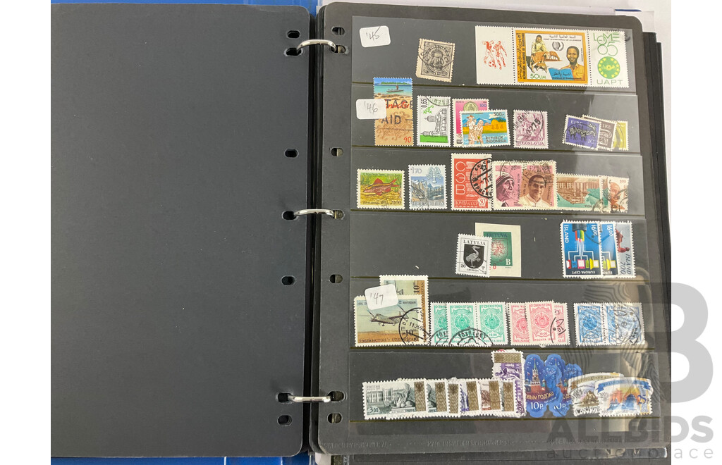 Album of International Stamps Including Australia, USA, UK, Maldives, Pakistan, Malta, Mints
