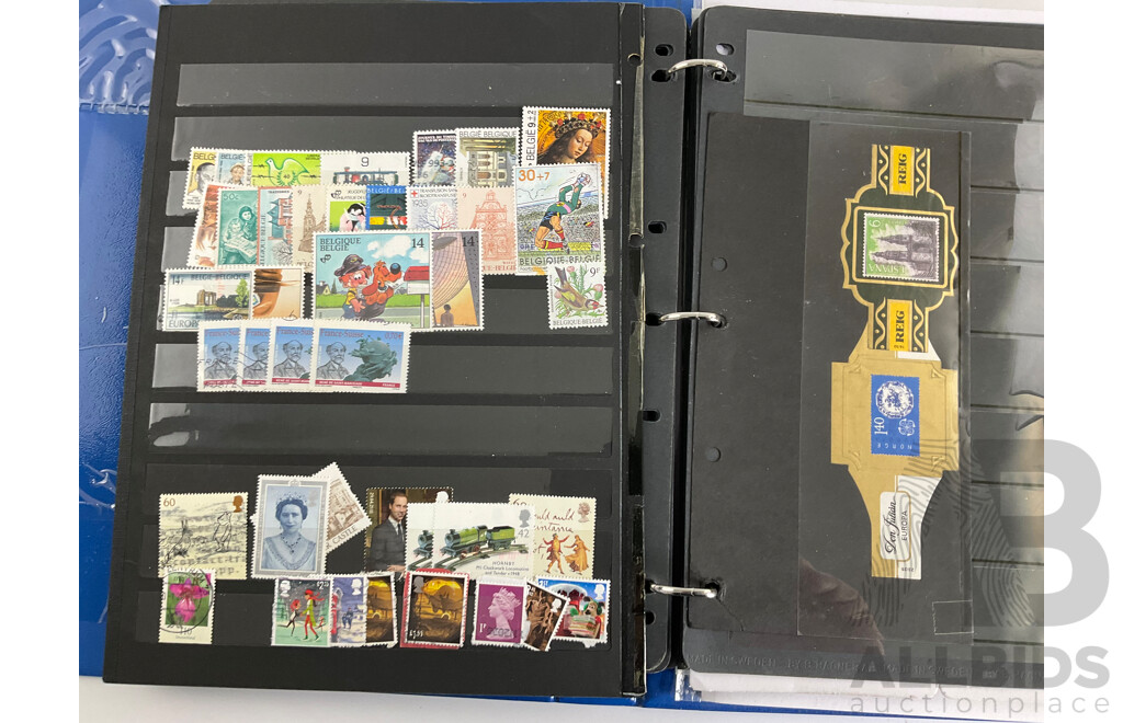 Album of International Stamps Including Australia, USA, UK, Maldives, Pakistan, Malta, Mints