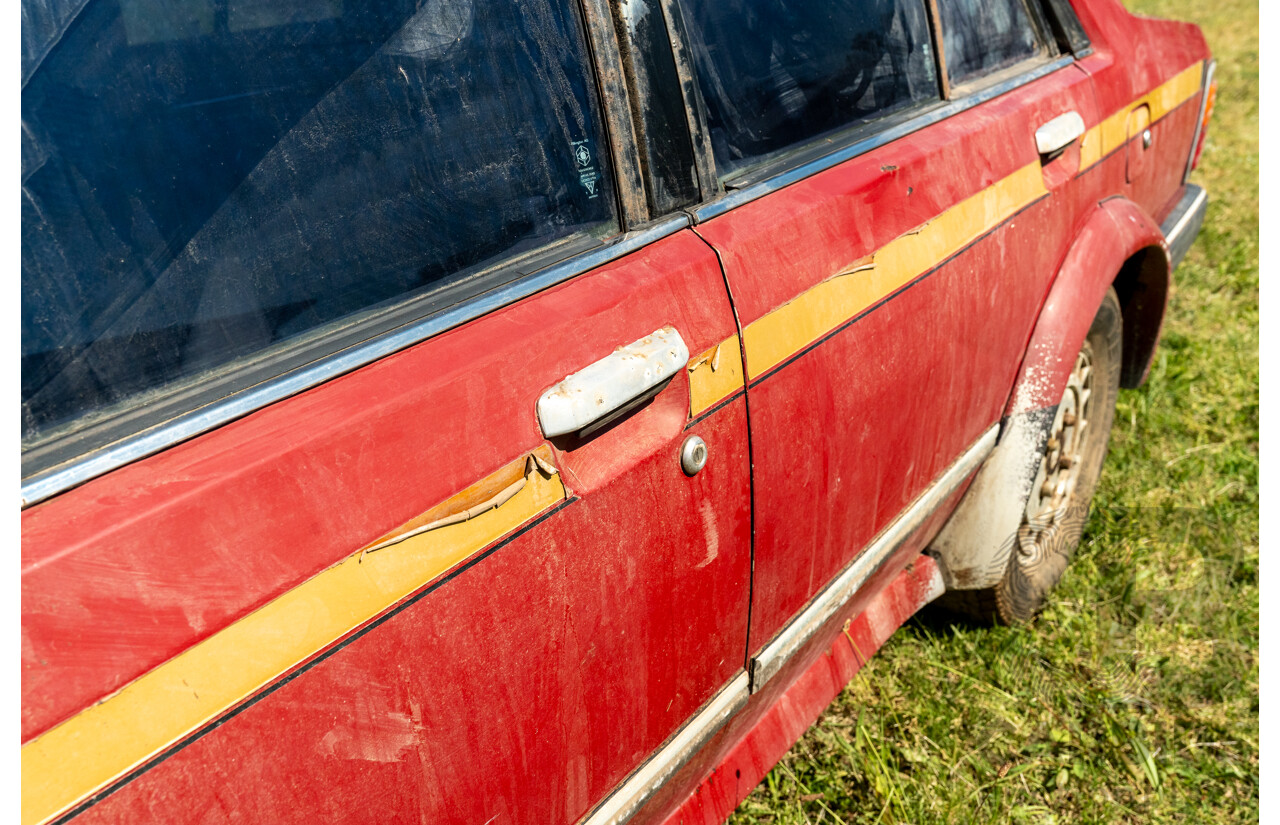 8/1982 Ford Meteor GL GA 4d Sedan Red 1.5L