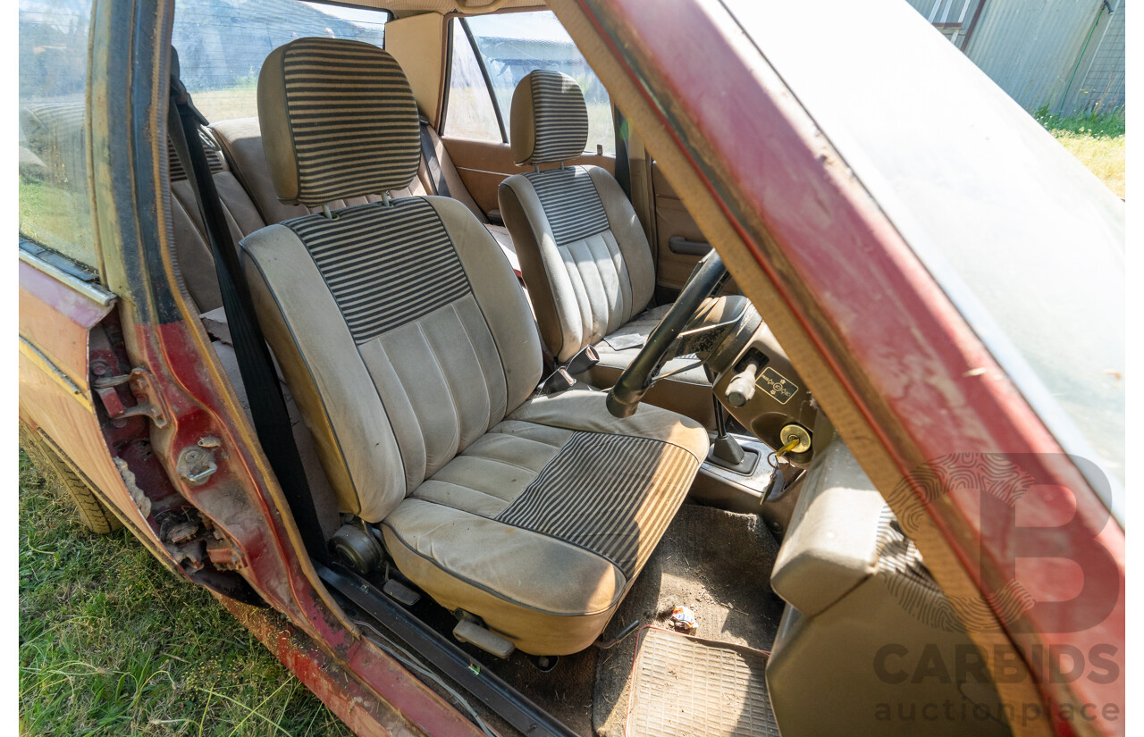 8/1982 Ford Meteor GL GA 4d Sedan Red 1.5L