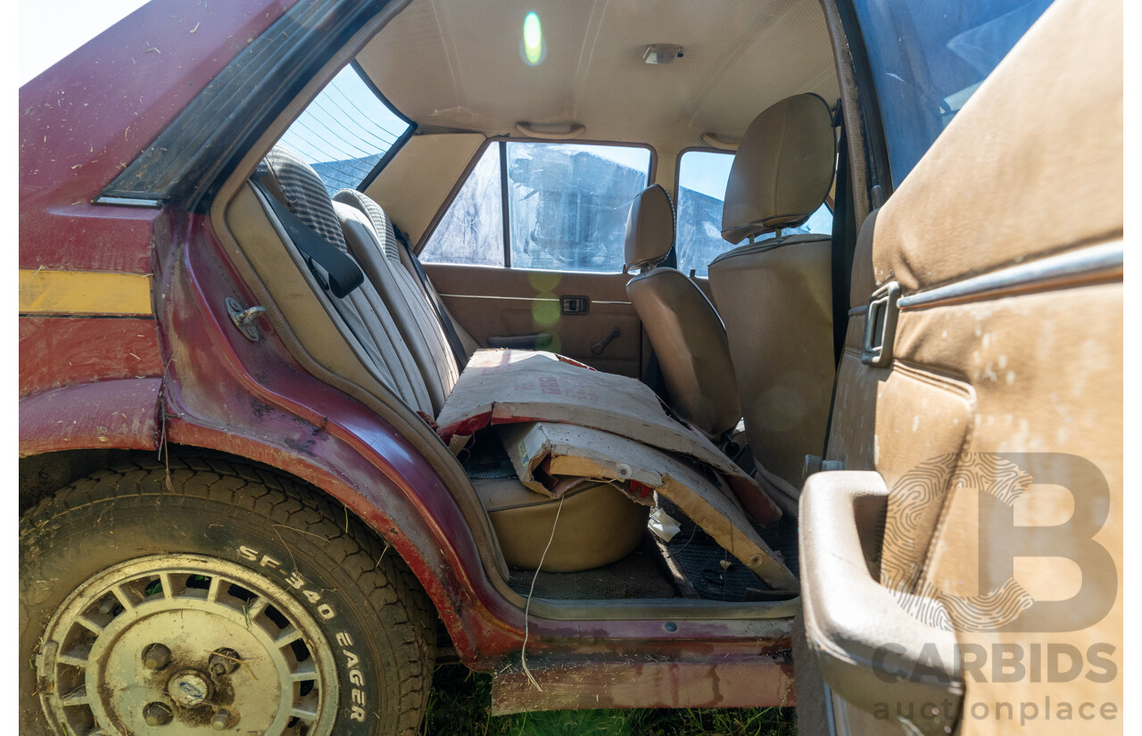 8/1982 Ford Meteor GL GA 4d Sedan Red 1.5L