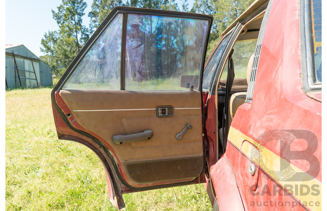 8/1982 Ford Meteor GL GA 4d Sedan Red 1.5L