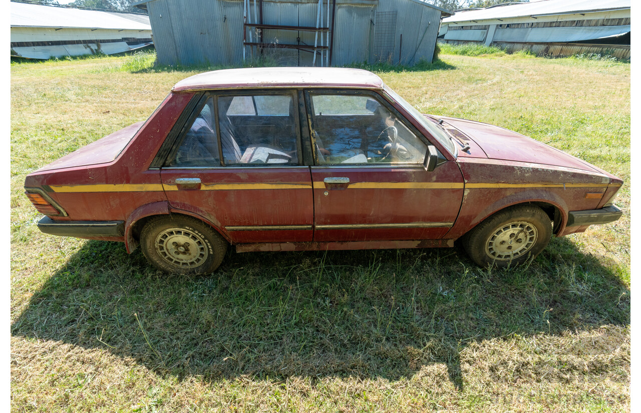 8/1982 Ford Meteor GL GA 4d Sedan Red 1.5L