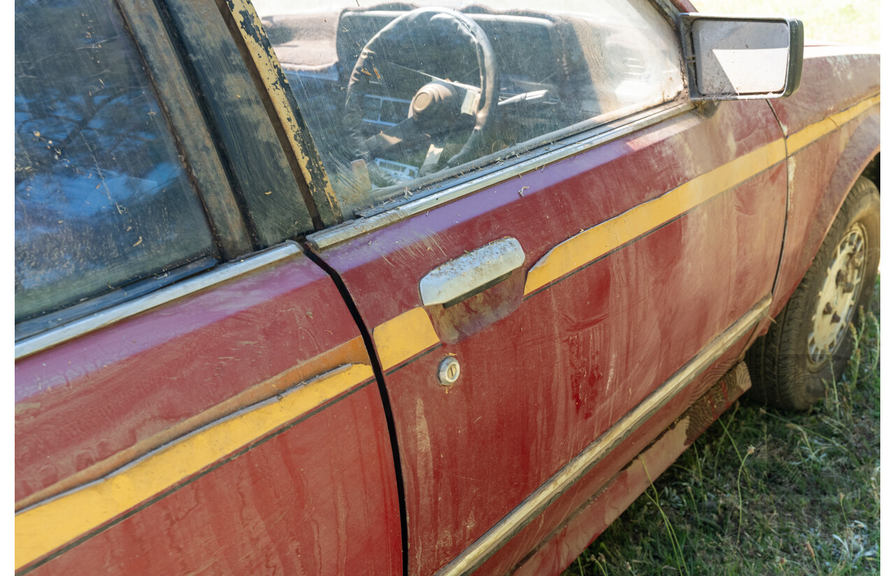 8/1982 Ford Meteor GL GA 4d Sedan Red 1.5L