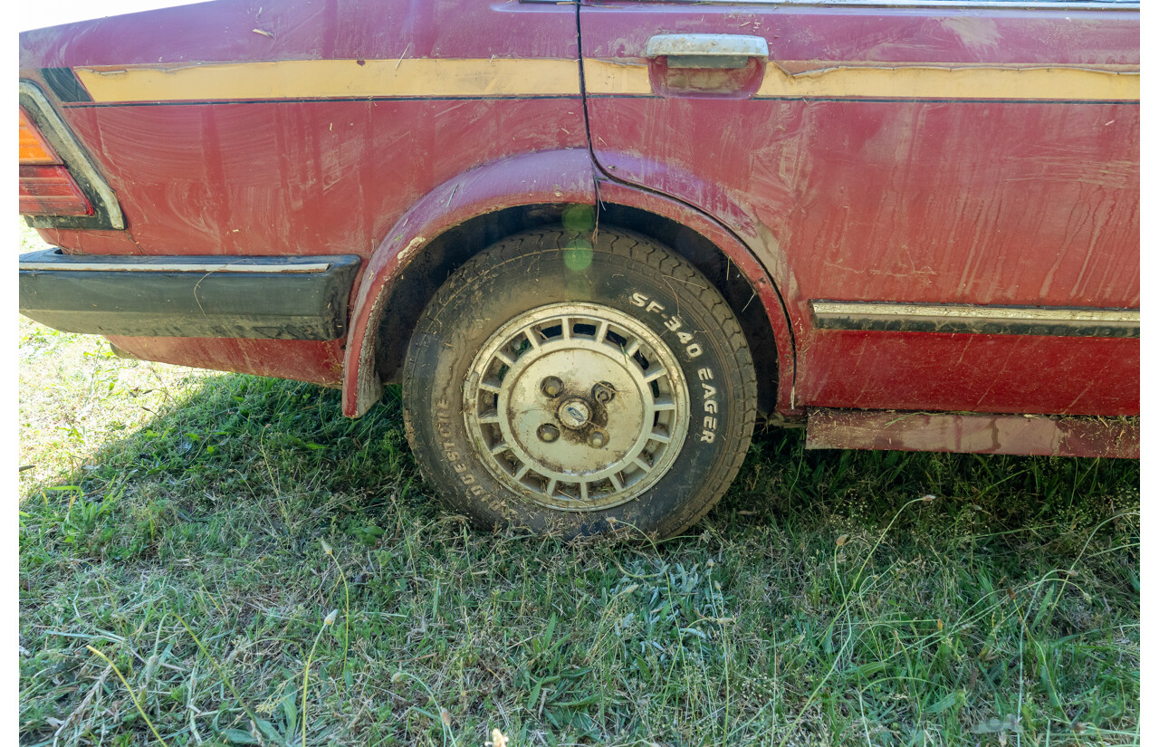 8/1982 Ford Meteor GL GA 4d Sedan Red 1.5L