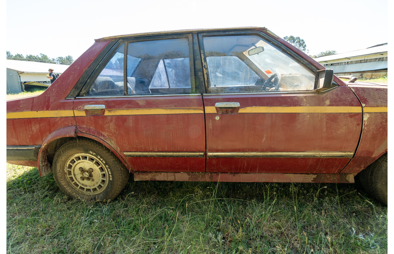 8/1982 Ford Meteor GL GA 4d Sedan Red 1.5L