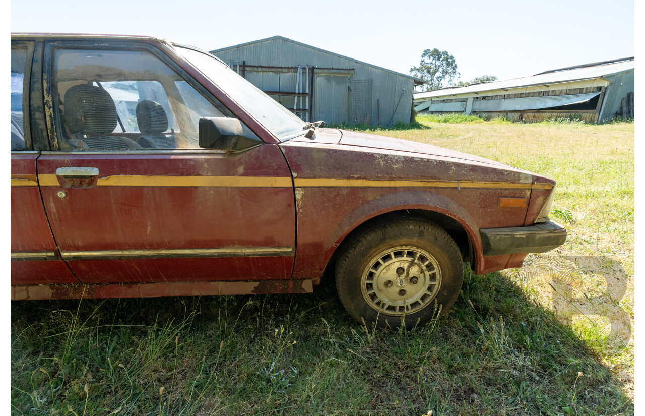 8/1982 Ford Meteor GL GA 4d Sedan Red 1.5L