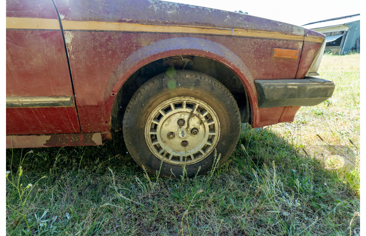 8/1982 Ford Meteor GL GA 4d Sedan Red 1.5L