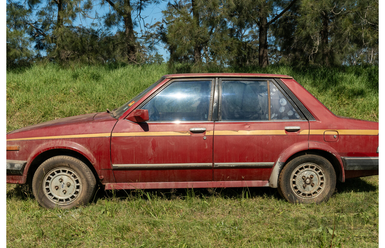 8/1982 Ford Meteor GL GA 4d Sedan Red 1.5L