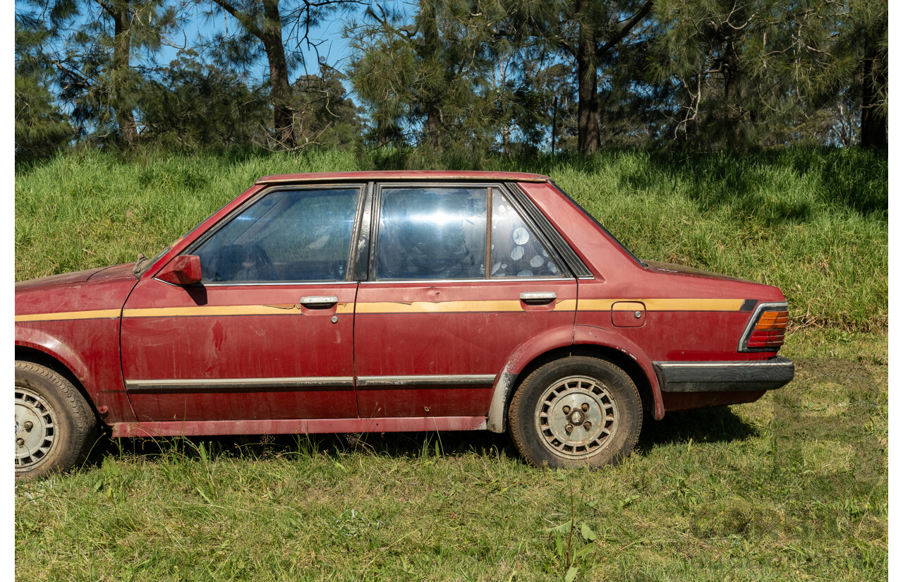 8/1982 Ford Meteor GL GA 4d Sedan Red 1.5L