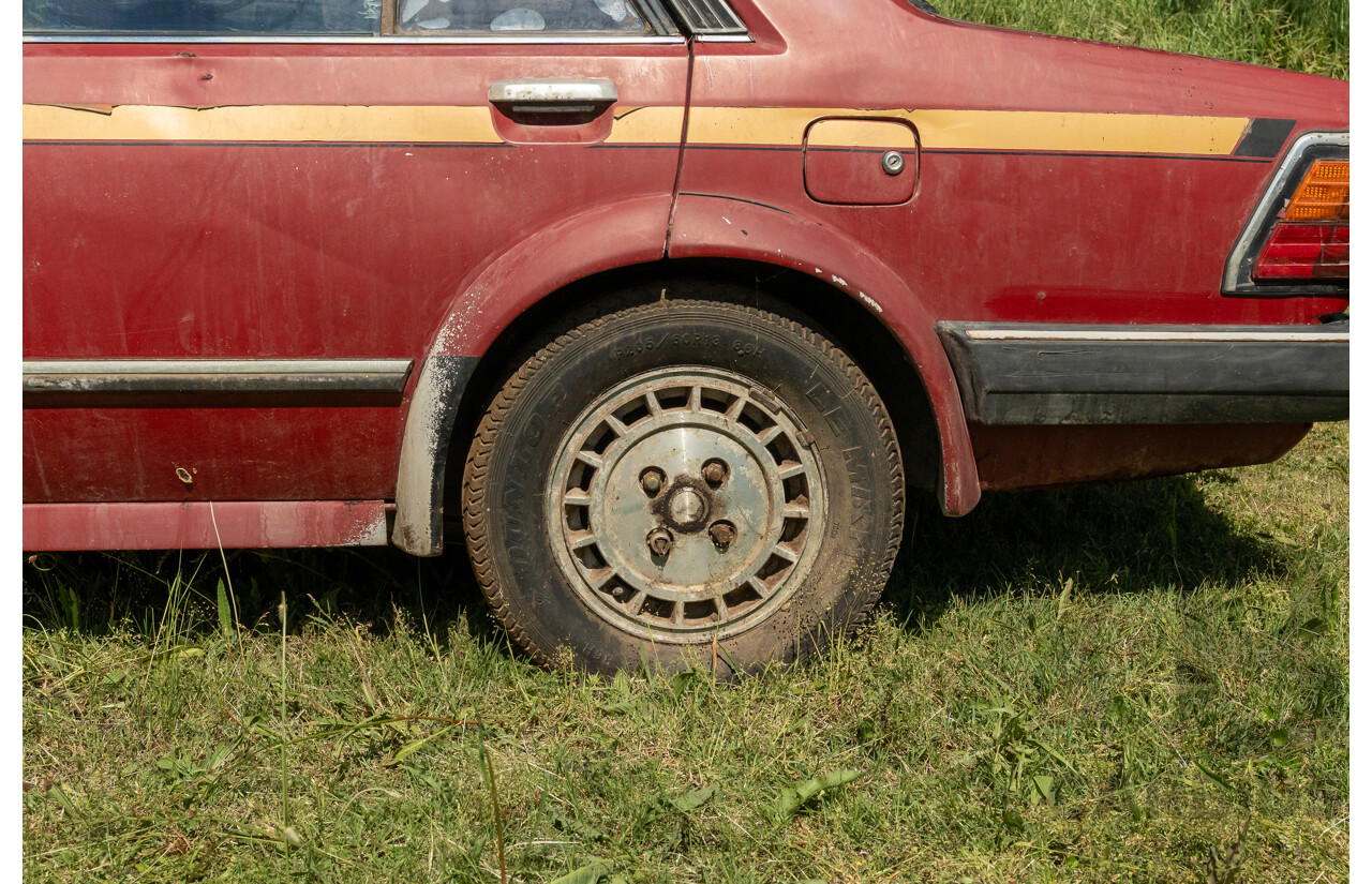 8/1982 Ford Meteor GL GA 4d Sedan Red 1.5L