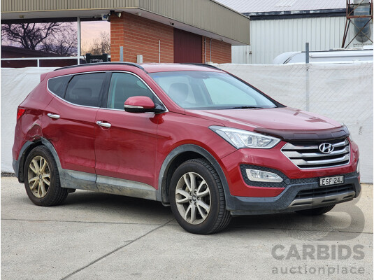 8/2014 Hyundai Santa Fe Elite CRDi (4x4) DM MY15 4d Wagon Red 2.2L