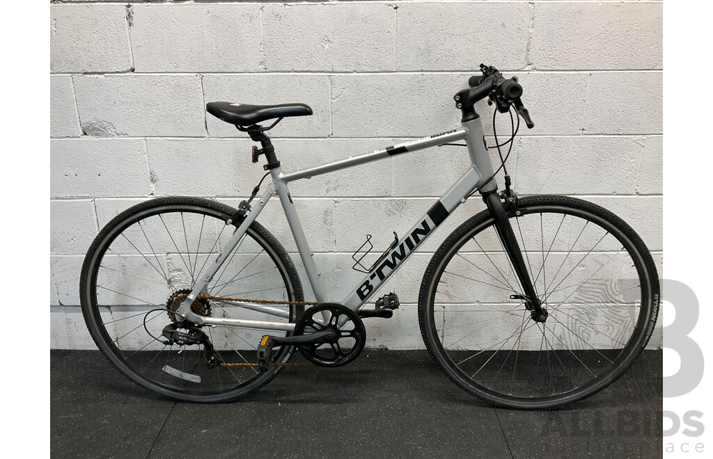 B'TWIN Triban Flat Bar Road Bike