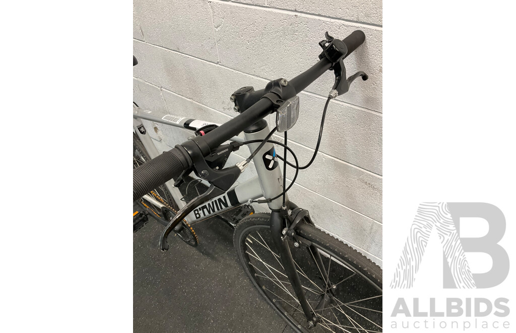B'TWIN Triban Flat Bar Road Bike