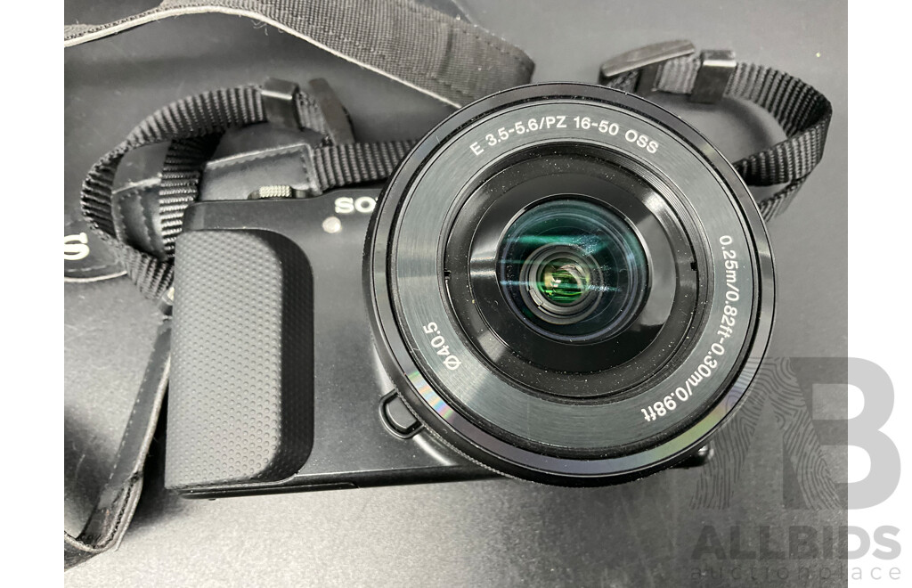 SONY Aplha Digital Camera with E 3.5-5.6/PZ 160-50 OSS Lens and Accessories