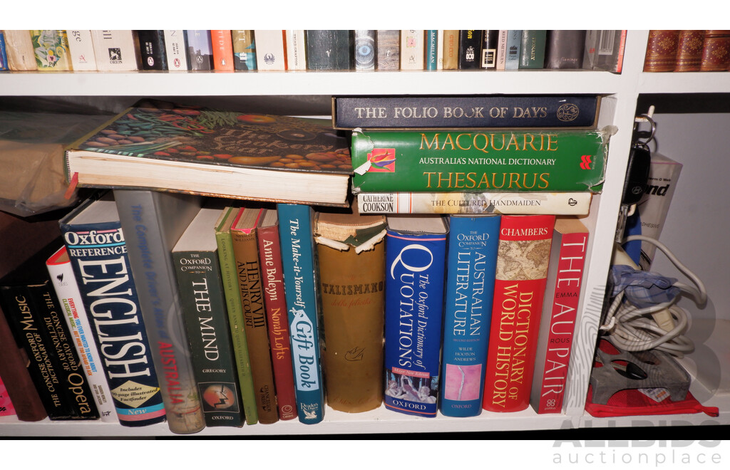 Large Collection of Books on Book Shelves in the Middle Room