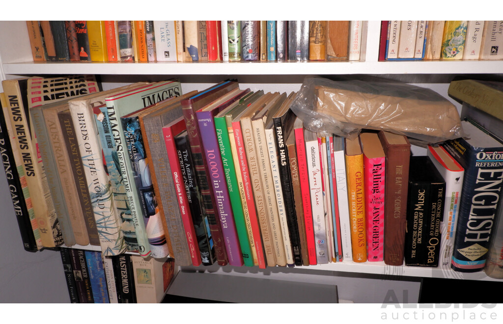 Large Collection of Books on Book Shelves in the Middle Room