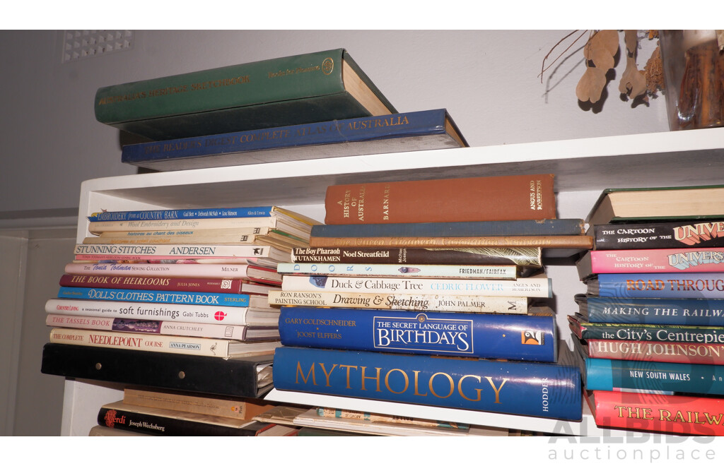 Large Collection of Books on Book Shelves in the Middle Room