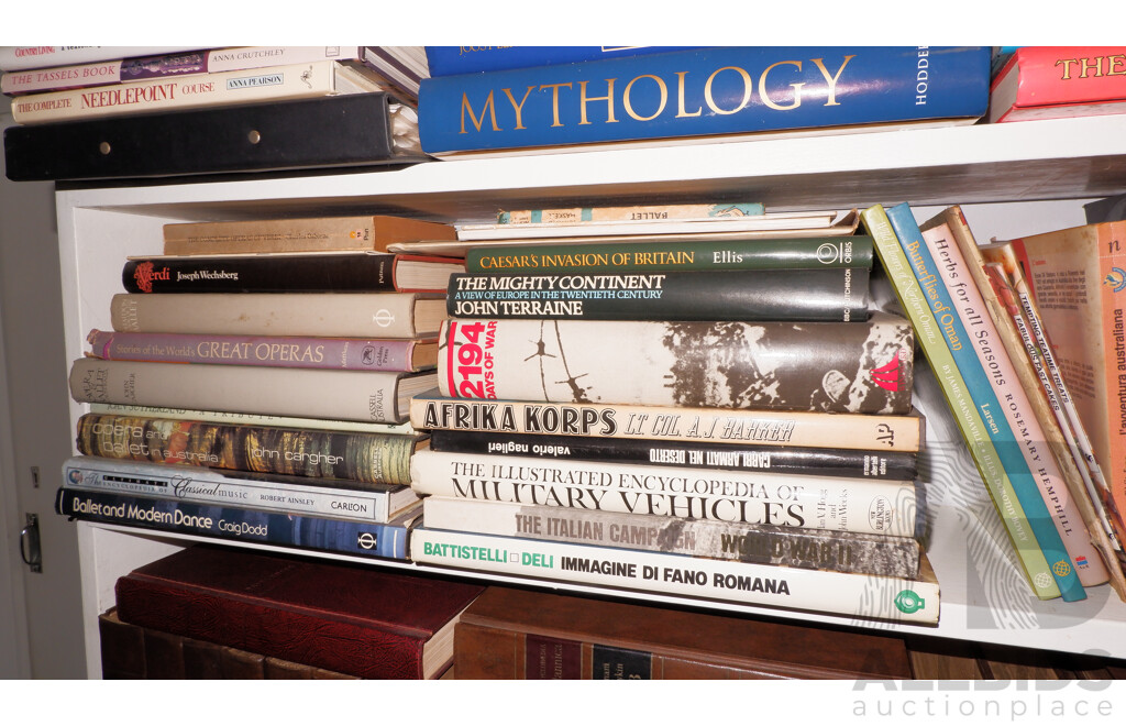 Large Collection of Books on Book Shelves in the Middle Room