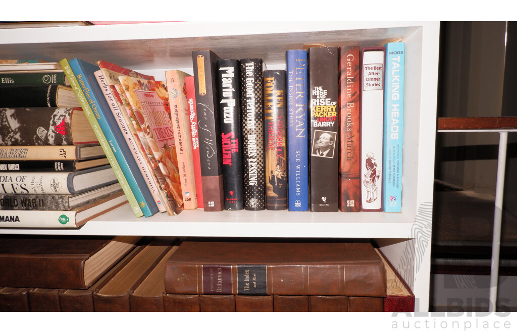 Large Collection of Books on Book Shelves in the Middle Room