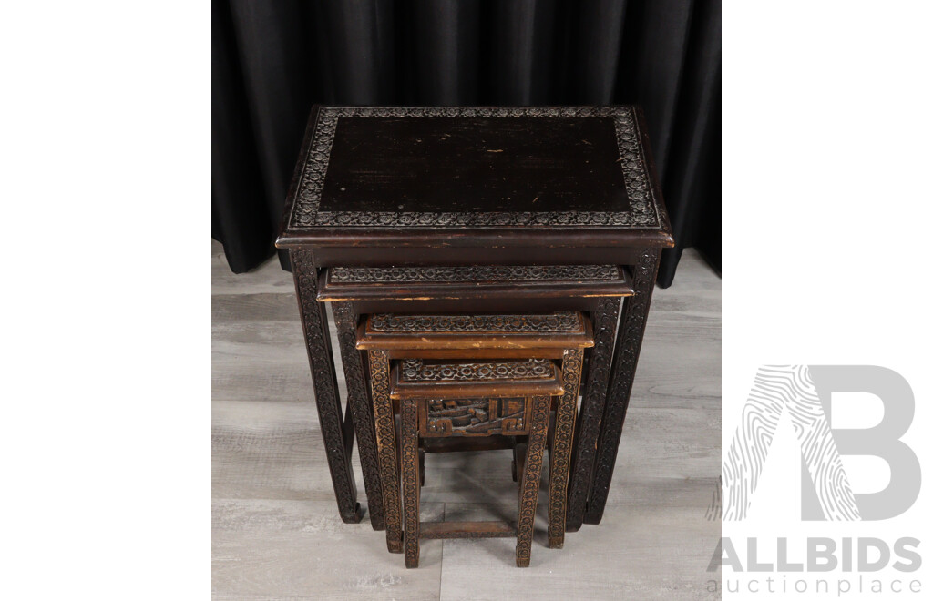 Set of Four Heavily Carved Nesting Tables