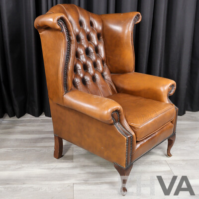 Pair of Leather Wingback Armchairs with Lift Top Ottomans
