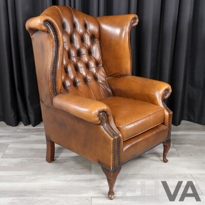 Pair of Leather Wingback Armchairs with Lift Top Ottomans
