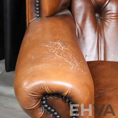 Pair of Leather Wingback Armchairs with Lift Top Ottomans