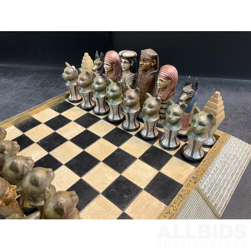 Assorted Egyptian Themed Items, Including Composite Chess Set, Sarcophagus and Onyx Sphinx Statue - Lot of 3